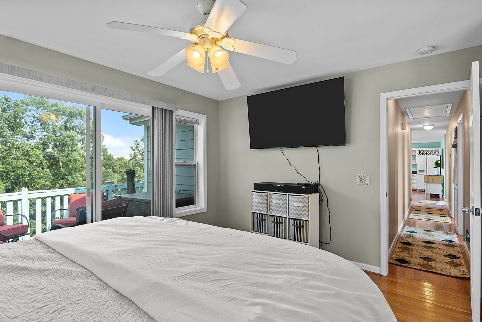 465 Turtle Point Lane Waverly, TN 37185 - Photo 36 of 49 a bedroom with a bed and a flat screen tv