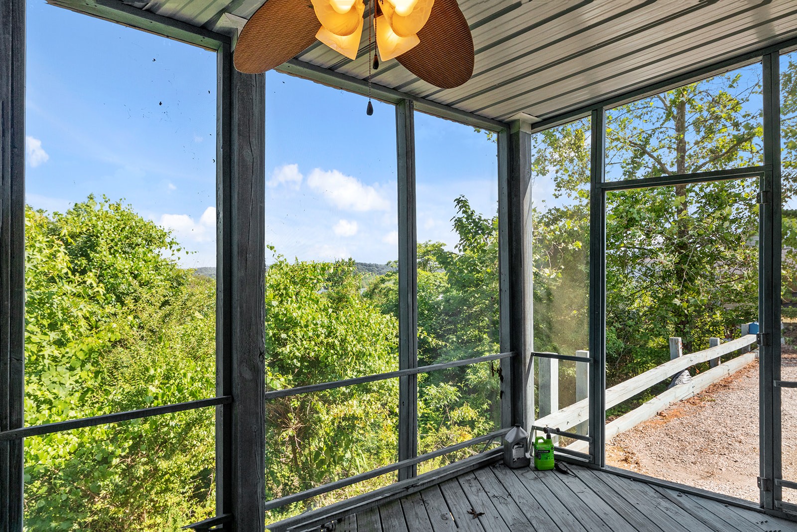 465 Turtle Point Lane Waverly, TN 37185 - Photo 37 of 49 a view of a room with wooden floor and iron stairs