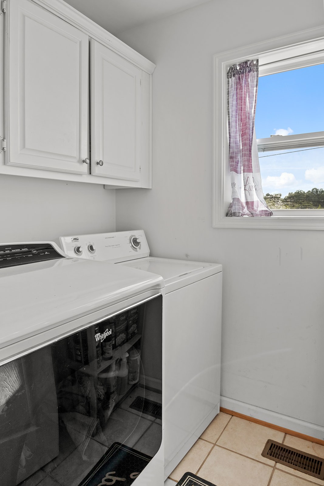465 Turtle Point Lane Waverly, TN 37185 - Photo 42 of 49 a utility room with stainless steel appliances cabinets and a window