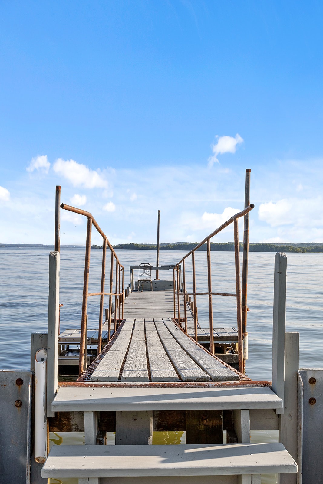 465 Turtle Point Lane Waverly, TN 37185 - Photo 46 of 49 a view of staircase going to roof with metal railing and city view