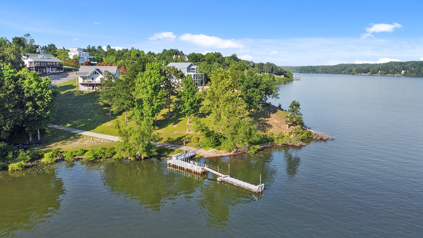 465 Turtle Point Lane Waverly, TN 37185 - Photo 9 of 49 a view of a lake with a mountain in the background