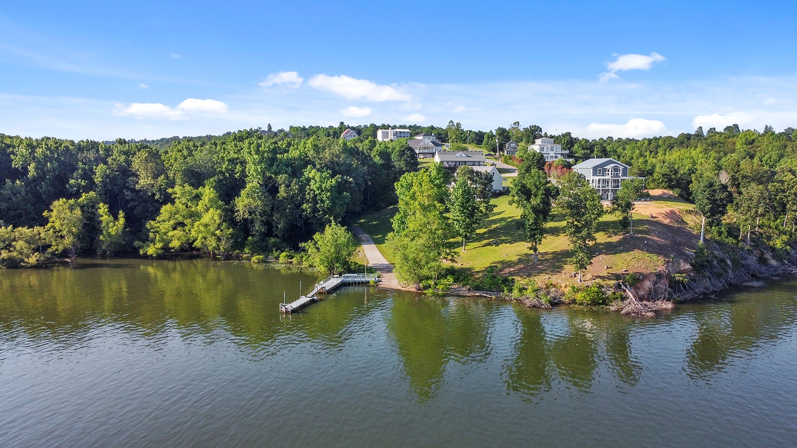 465 Turtle Point Lane Waverly, TN 37185 - Photo 10 of 49 a view of a lake with houses in the back