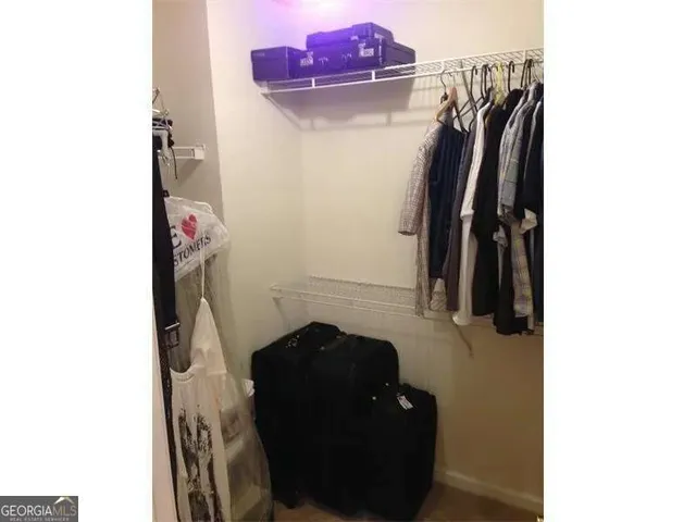 a bathroom with a tub and a shower