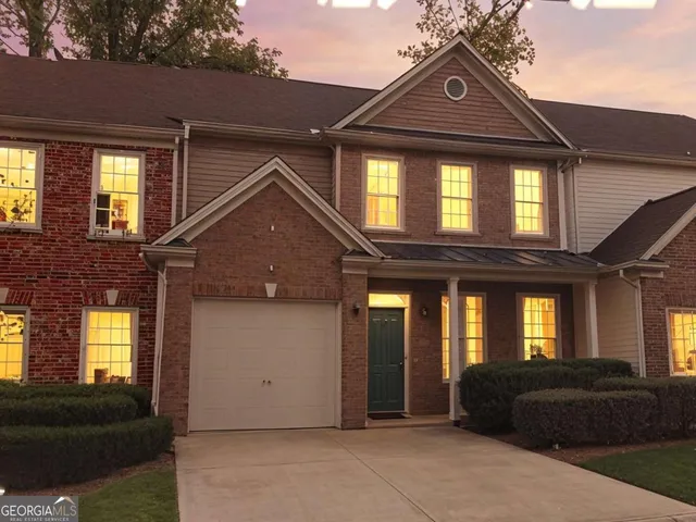a view of a house with a large window
