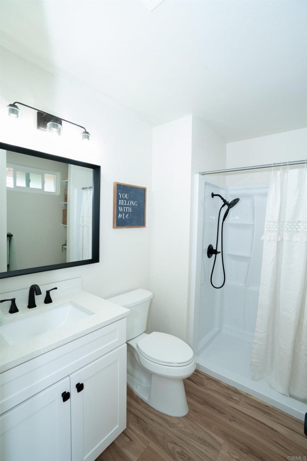 4080 Lake Boulevard Oceanside, CA 92056 - Photo 15 of 28 a bathroom with a sink a toilet and shower