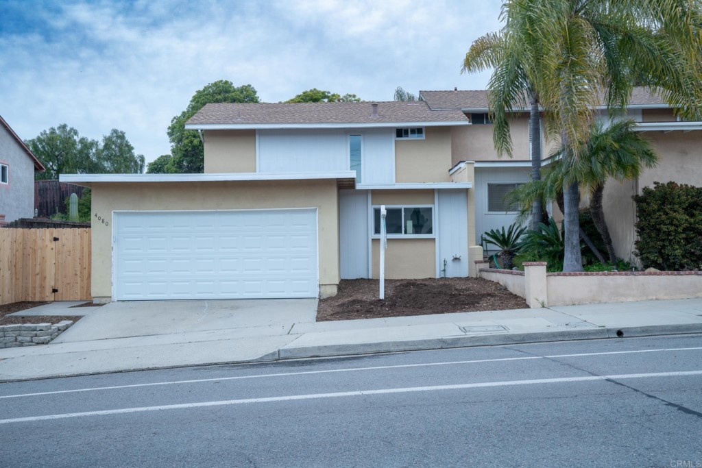 4080 Lake Boulevard Oceanside, CA 92056 - Photo 27 of 28 a front view of a house with garage