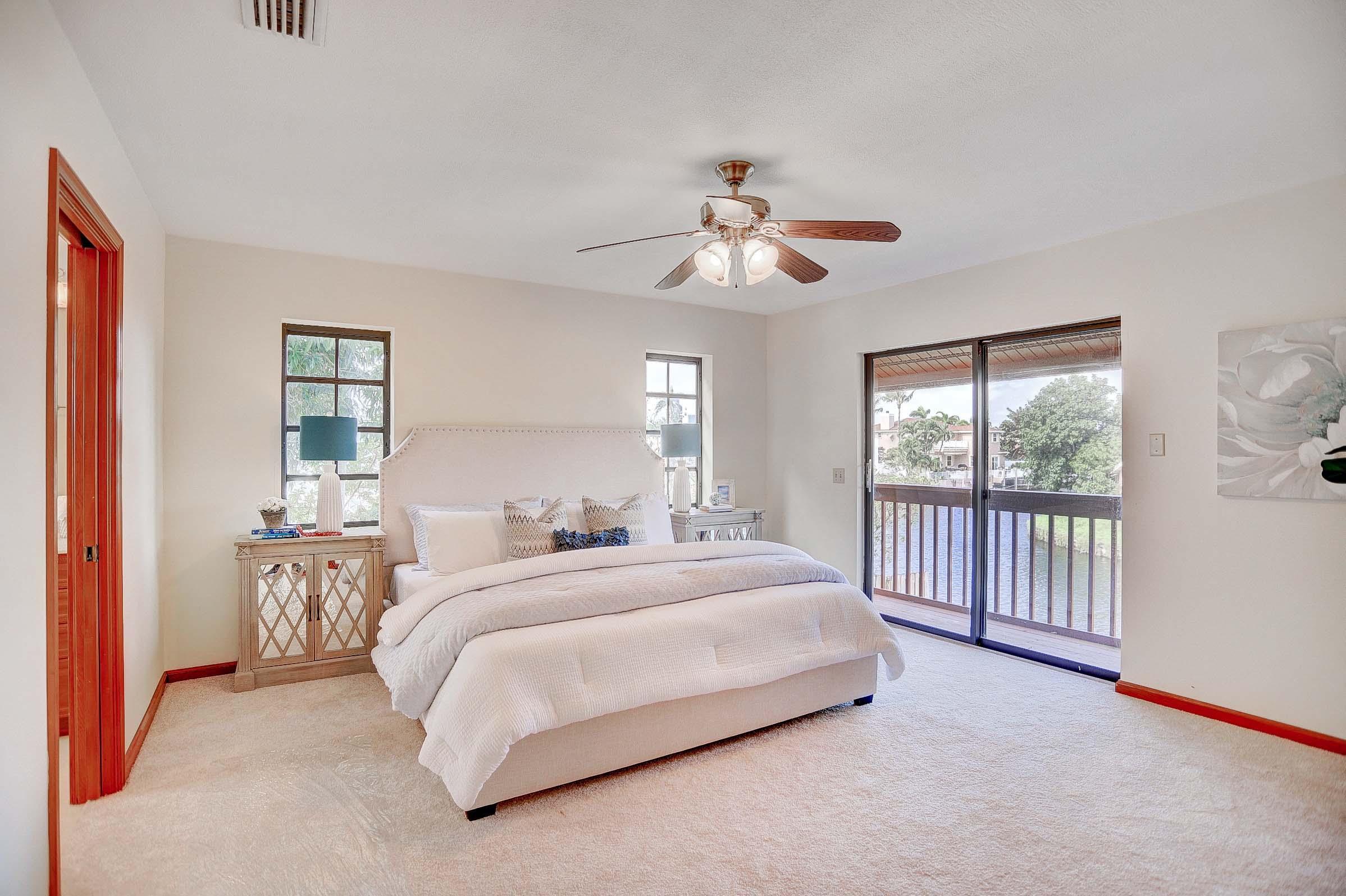 399 Southwest 15th Street Boca Raton, FL 33432 - Photo 16 of 53 MASTER BEDROOM WITH LONG WATER VIEWS