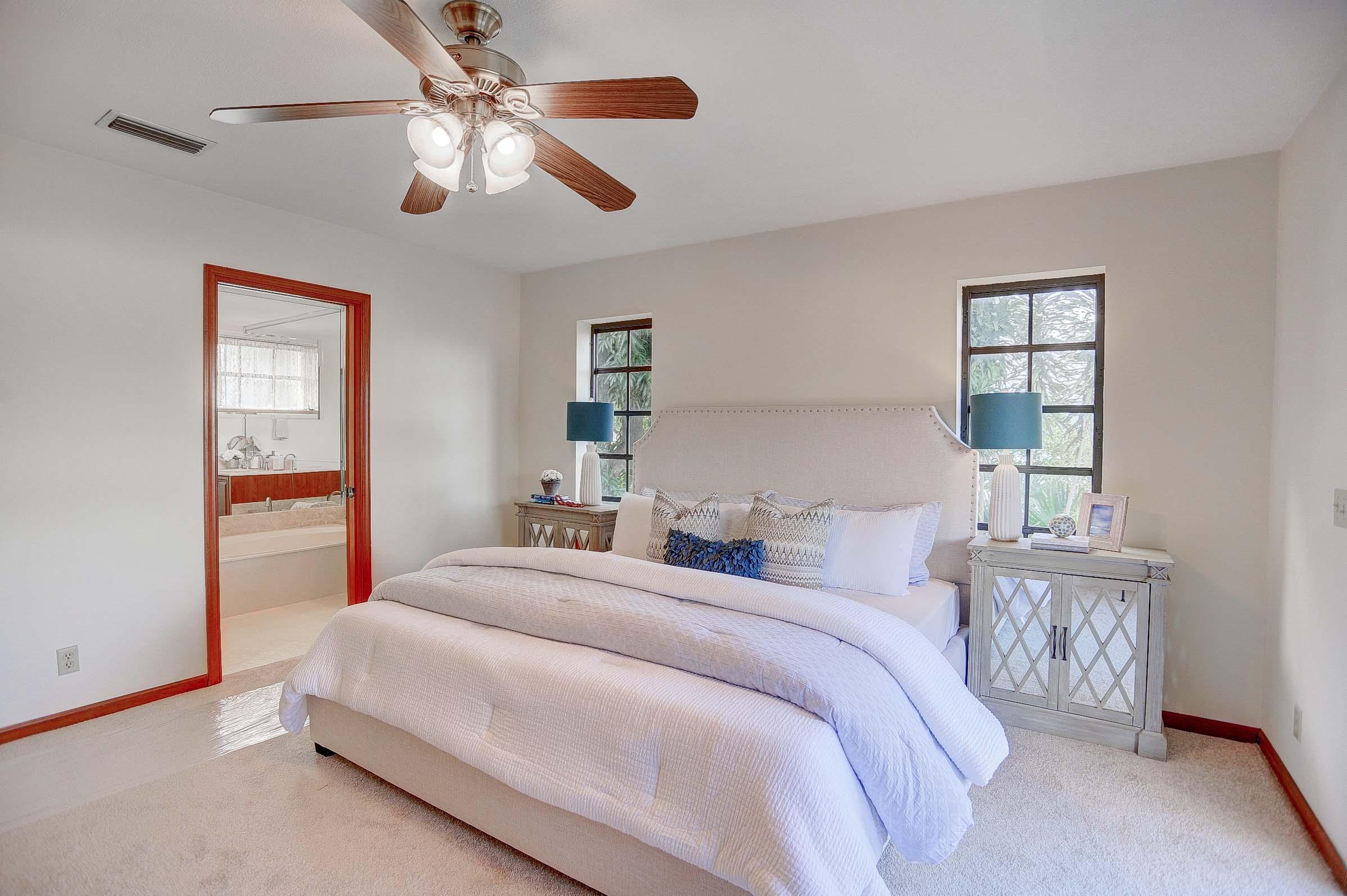 399 Southwest 15th Street Boca Raton, FL 33432 - Photo 18 of 53 MASTER BEDROOM WITH EN SUITE BATHROOM