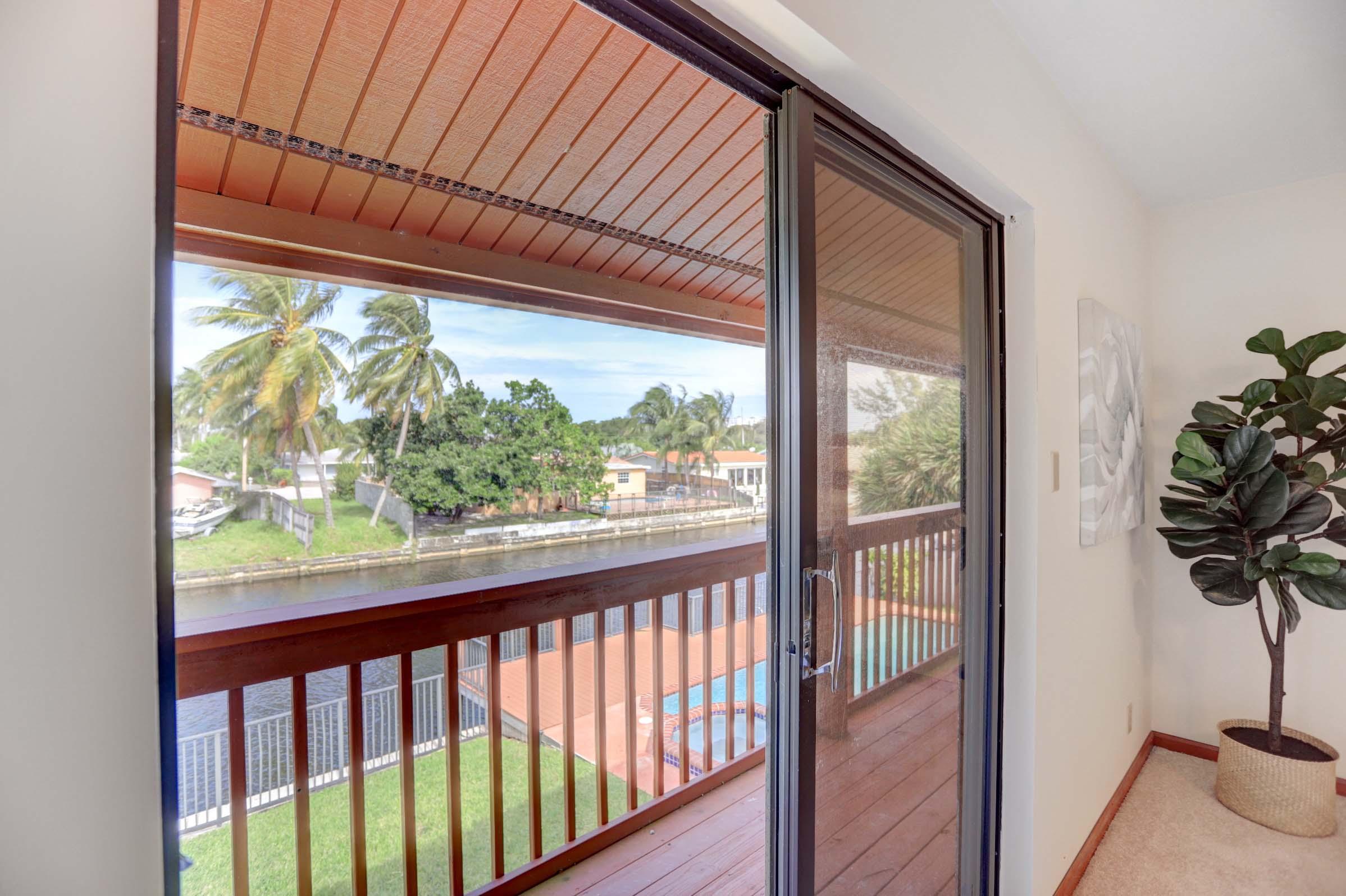 399 Southwest 15th Street Boca Raton, FL 33432 - Photo 21 of 53 ACCESS TO BALCONY FROM MASTER BEDROOM