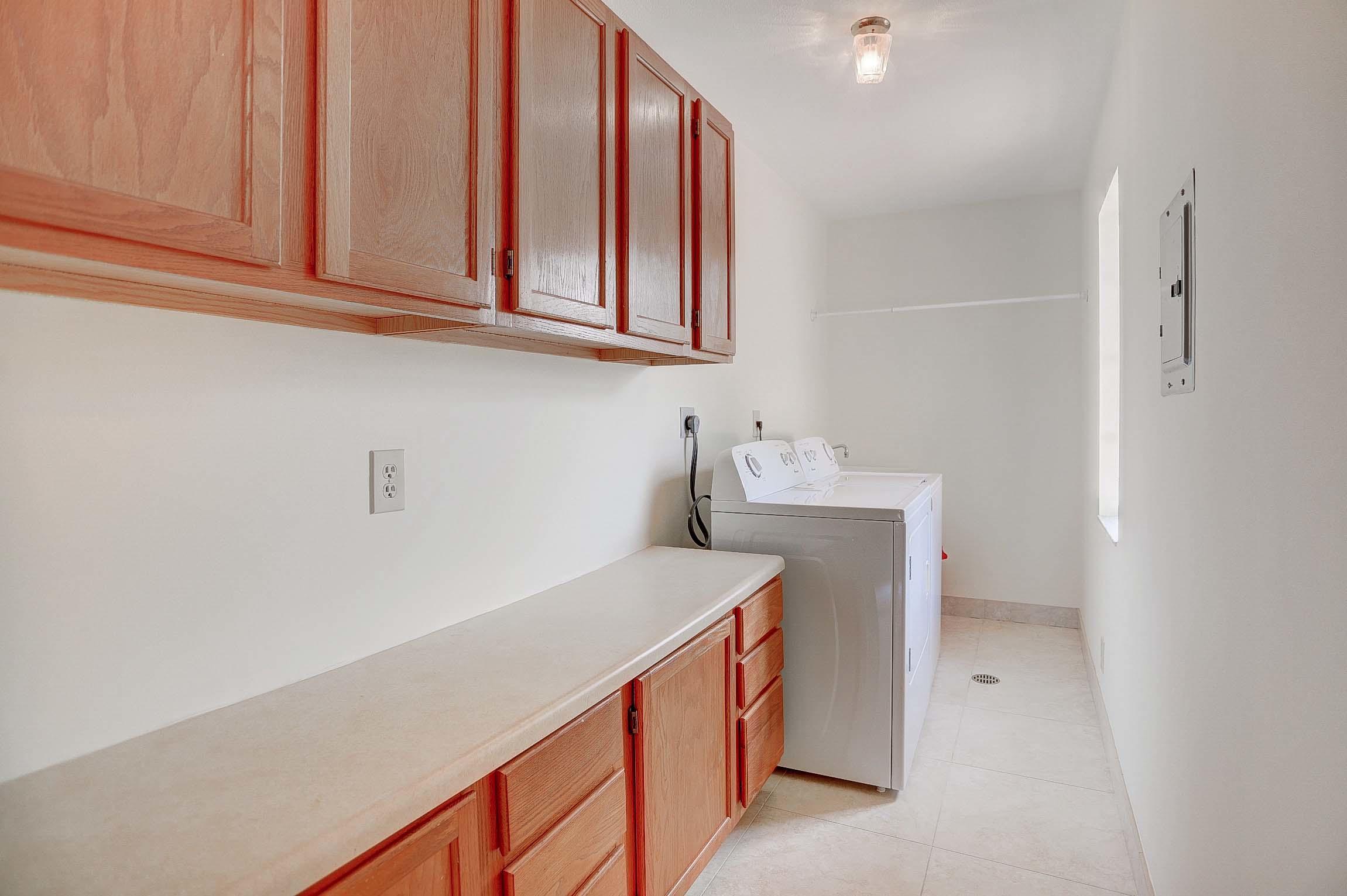 399 Southwest 15th Street Boca Raton, FL 33432 - Photo 26 of 53 LARGE LAUNDRY ROOM ON SECOND FLOOR