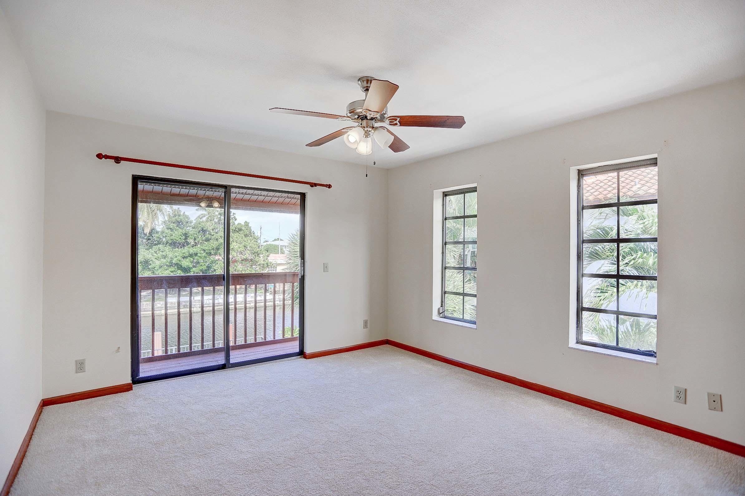 399 Southwest 15th Street Boca Raton, FL 33432 - Photo 32 of 53 GUEST BEDROOM WITH CANAL VIEWS