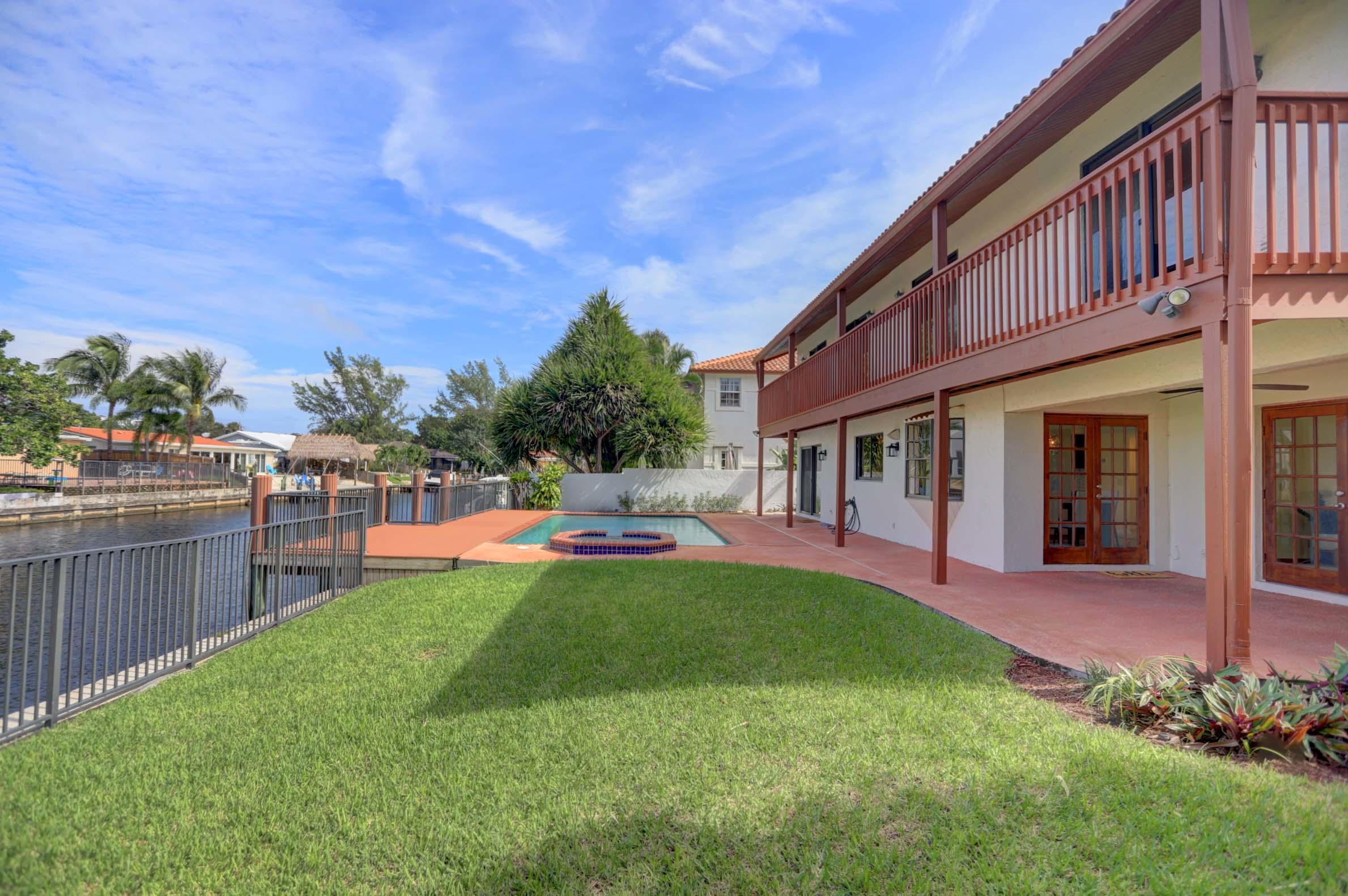 399 Southwest 15th Street Boca Raton, FL 33432 - Photo 35 of 53 GREEN AREA FOR PLAYING OR DOGS