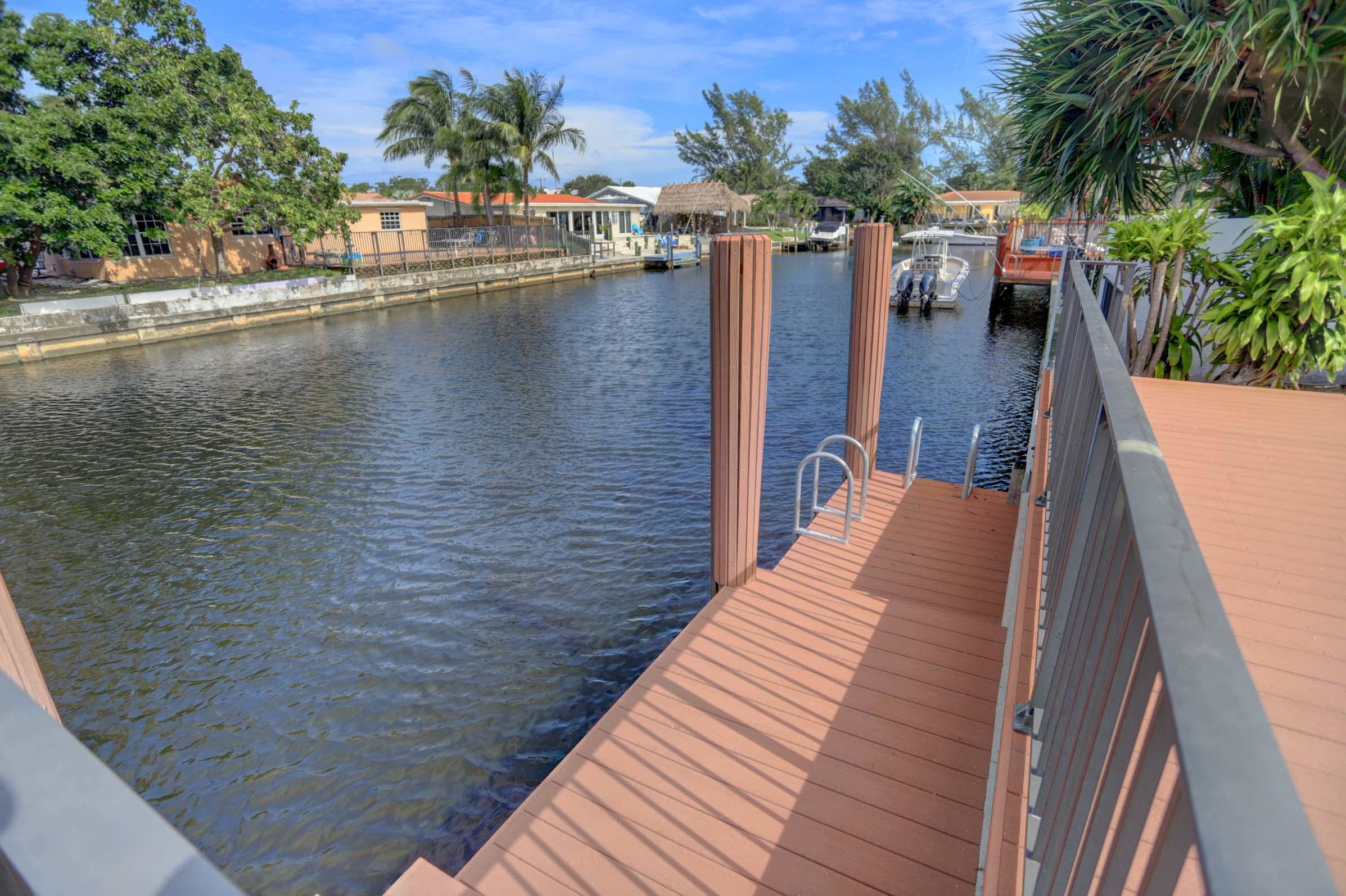 399 Southwest 15th Street Boca Raton, FL 33432 - Photo 39 of 53 WIDE CANAL WITH EVERGRAIN DOCK