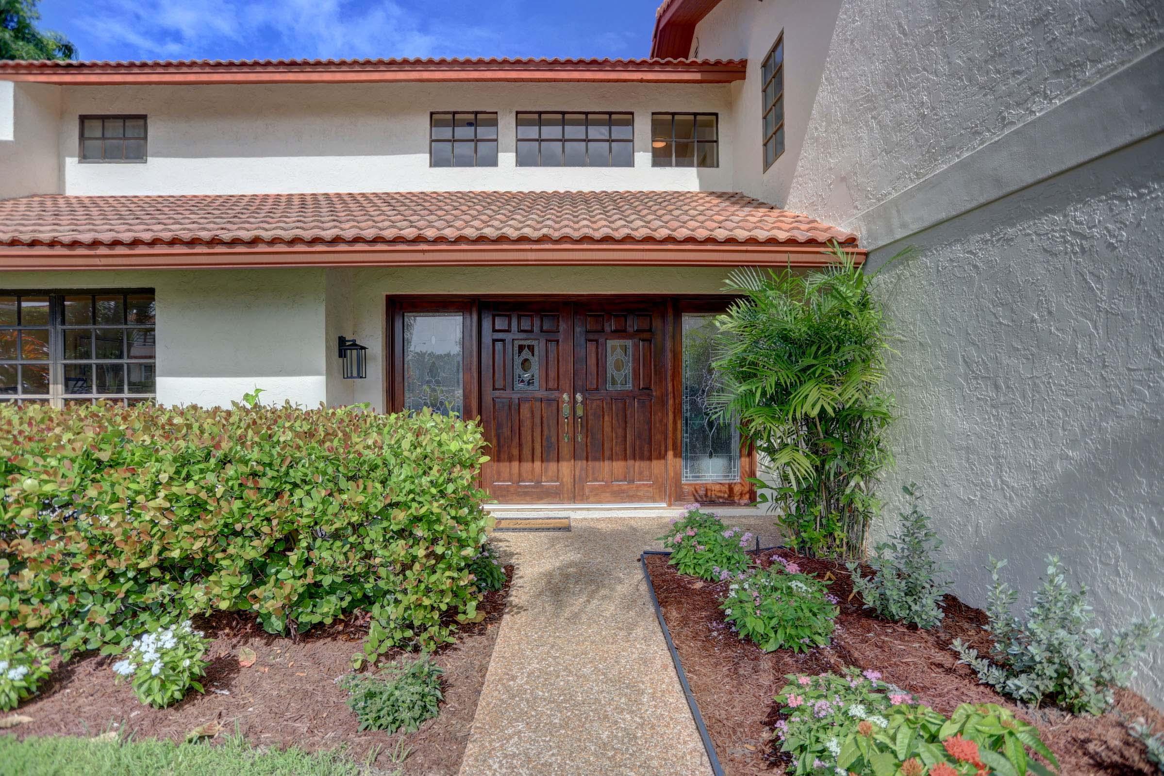 399 Southwest 15th Street Boca Raton, FL 33432 - Photo 41 of 53 REFINISHED MAIN DOOR