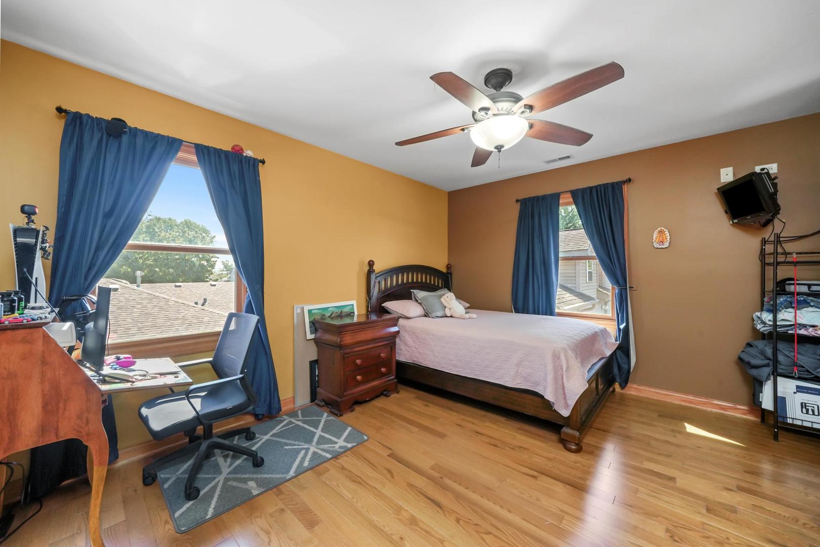 5907 West 109th Street Chicago Ridge, IL 60415 - Photo 27 of 45 a bedroom with a bed and a window