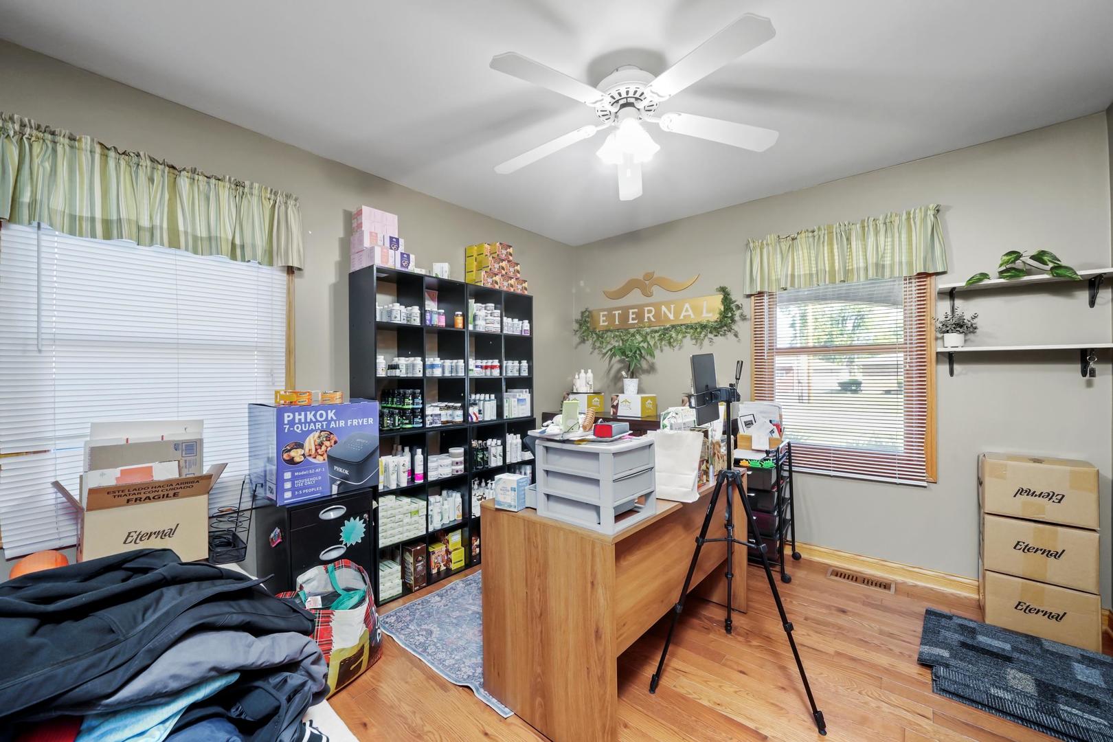 5907 West 109th Street Chicago Ridge, IL 60415 - Photo 28 of 45 a work room with furniture and a bookshelf
