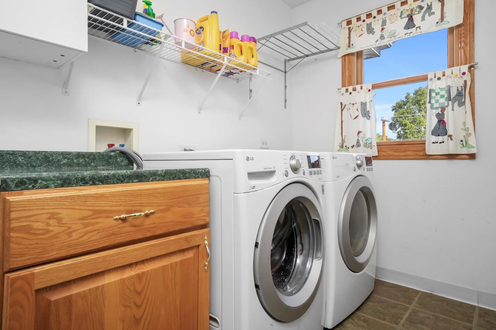5907 West 109th Street Chicago Ridge, IL 60415 - Photo 37 of 45 a view of a storage & utility room with washer and dryer