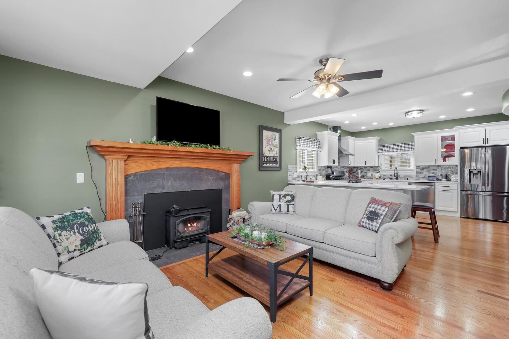 5907 West 109th Street Chicago Ridge, IL 60415 - Photo 38 of 45 a living room with furniture and a fireplace