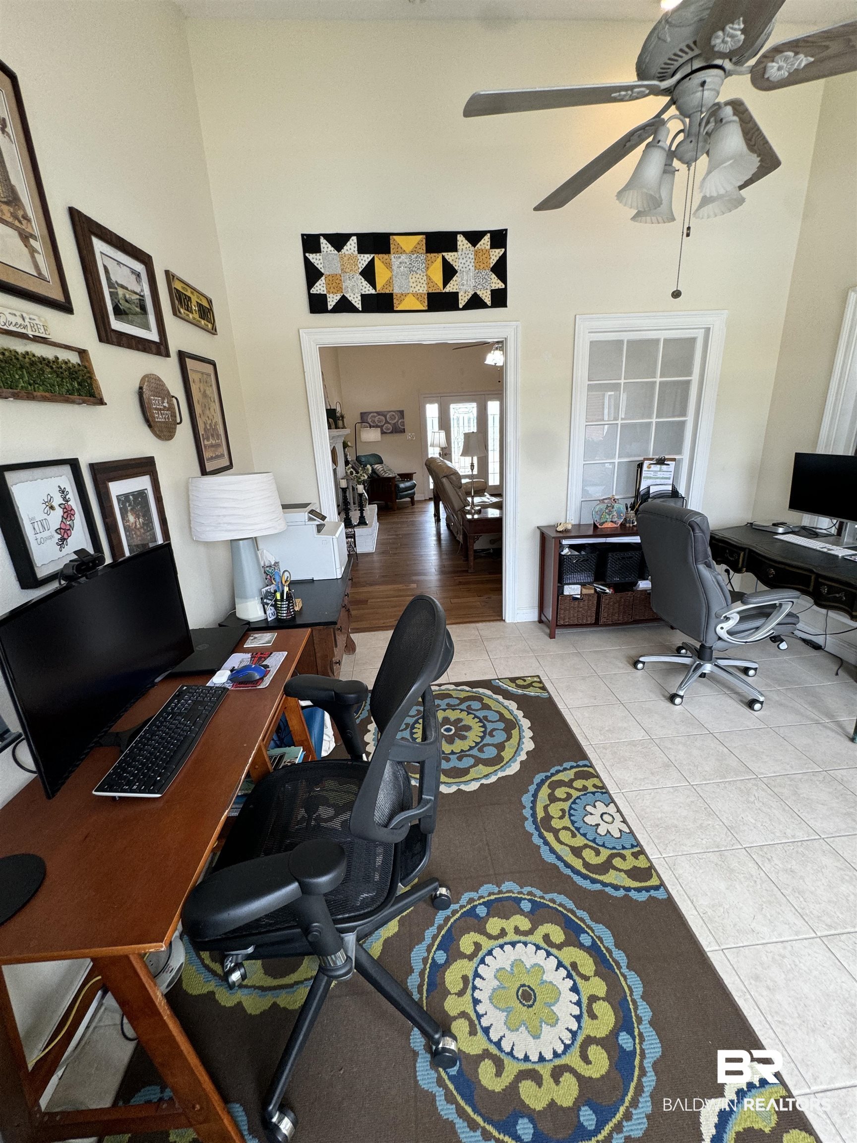 15165 Daugherty Road Foley, AL 36535 - Photo 23 of 70 Tiled home office featuring ceiling fan and a high ceiling