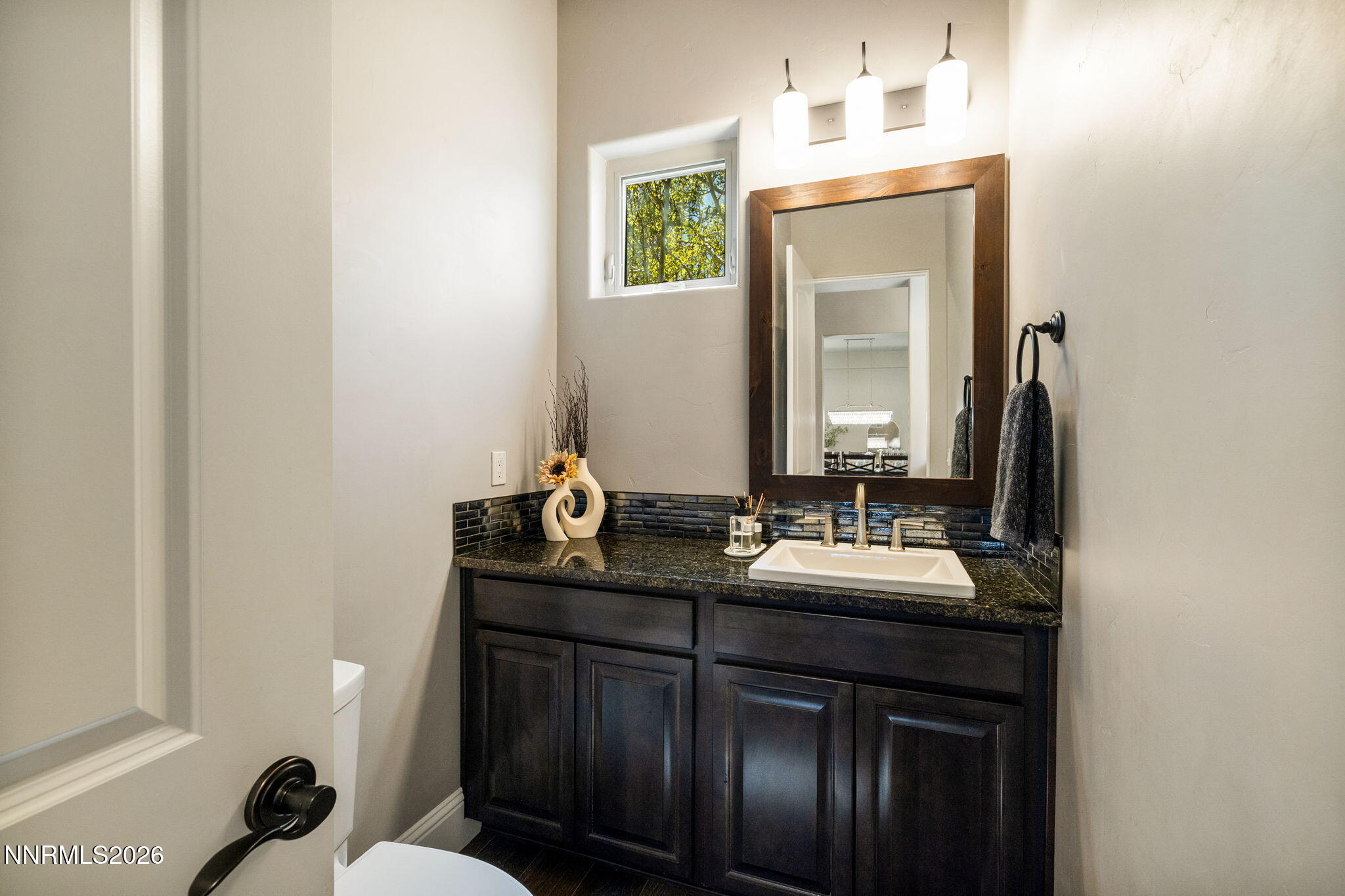 3172 Vista Favoloso Reno, NV 89519 - Photo 38 of 71 a bathroom with a sink and a mirror