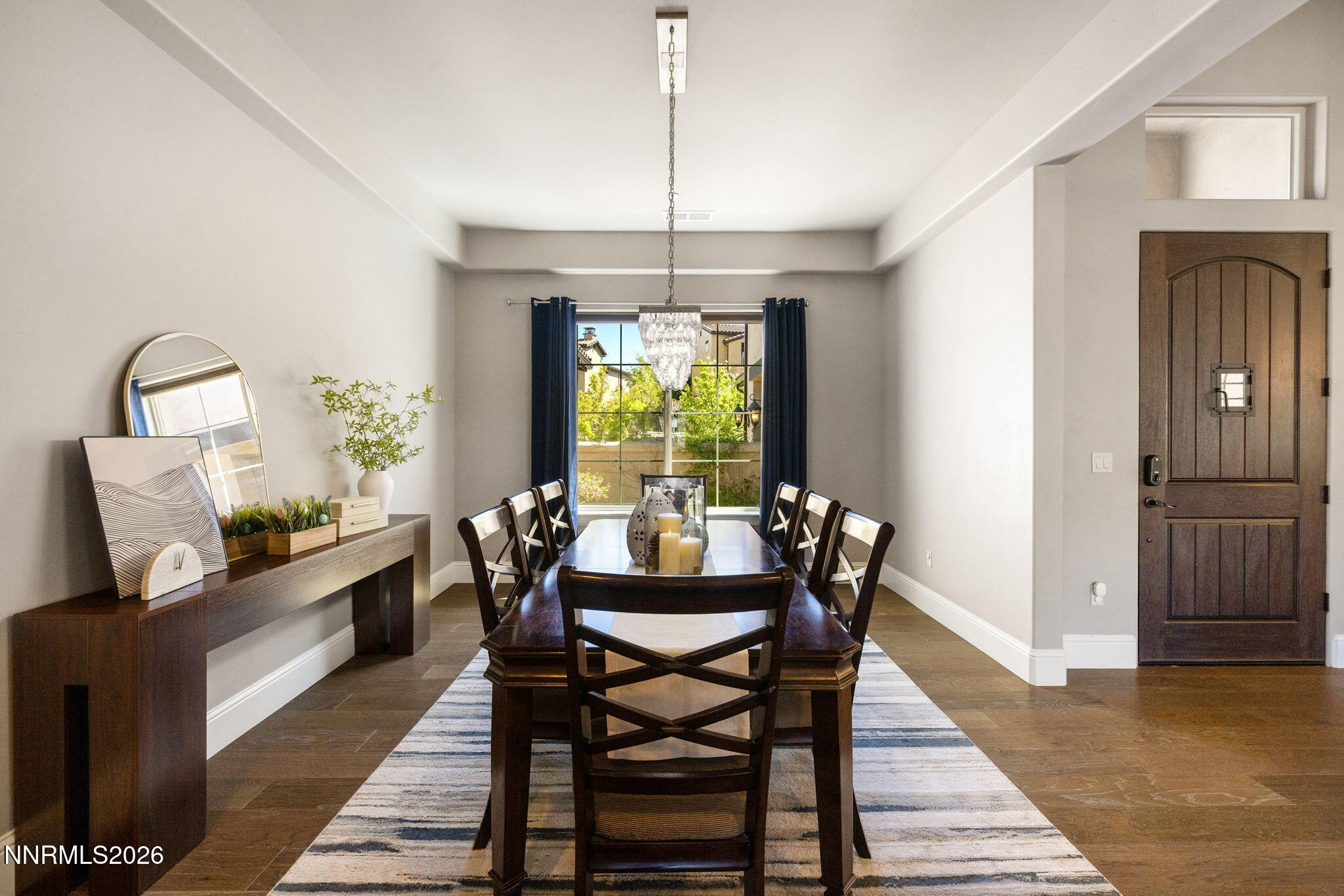 3172 Vista Favoloso Reno, NV 89519 - Photo 6 of 71 a dining room with furniture a chandelier and wooden floor