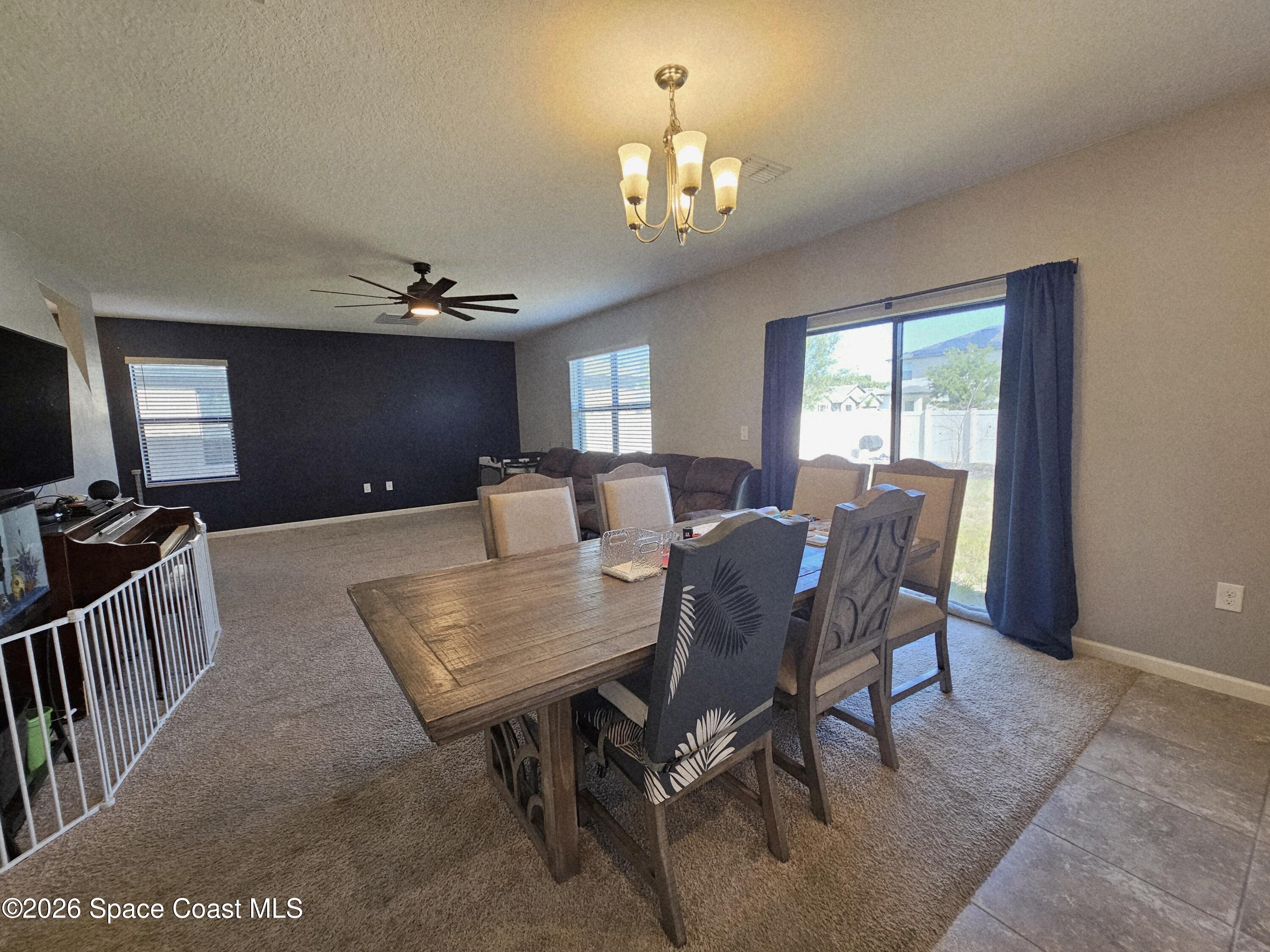 456 Snook Place Cocoa, FL 32927 - Photo 8 of 15 a view of a dining room with furniture