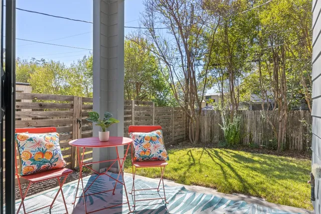 a view of swimming pool with a patio