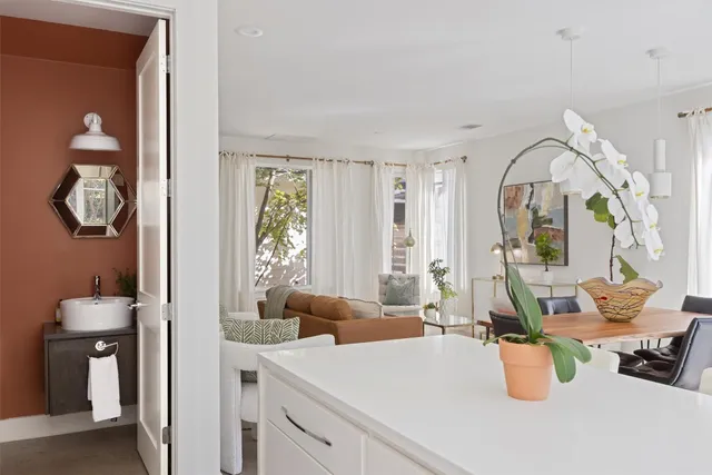 a room with sink and mirror