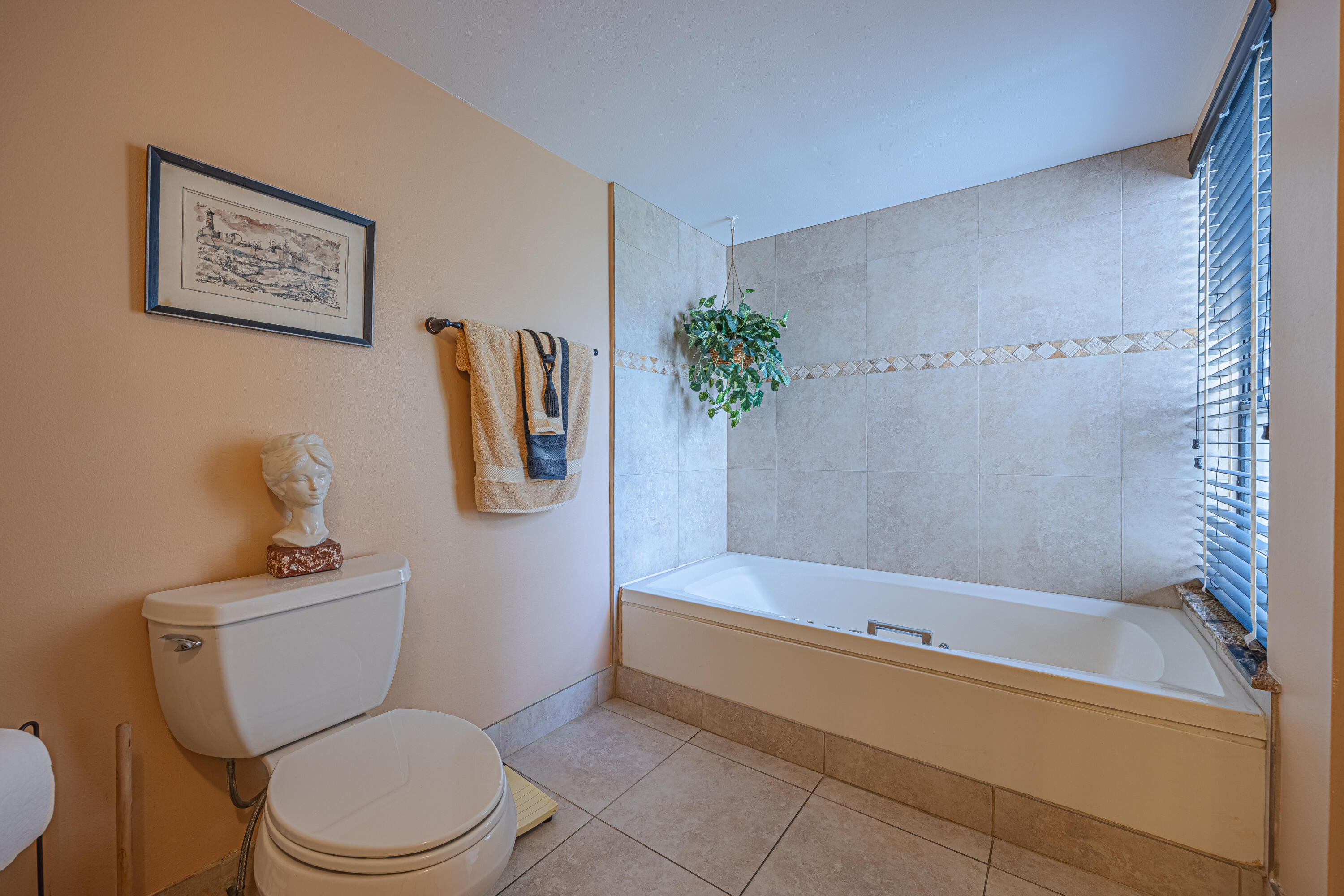 5750 Camino Del Sol, Unit 202 Boca Raton, FL 33433 - Photo 11 of 24 a white toilet sitting next to a bath tub