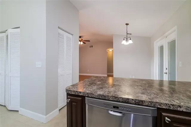 a view of a granite countertop cabinets and a sink