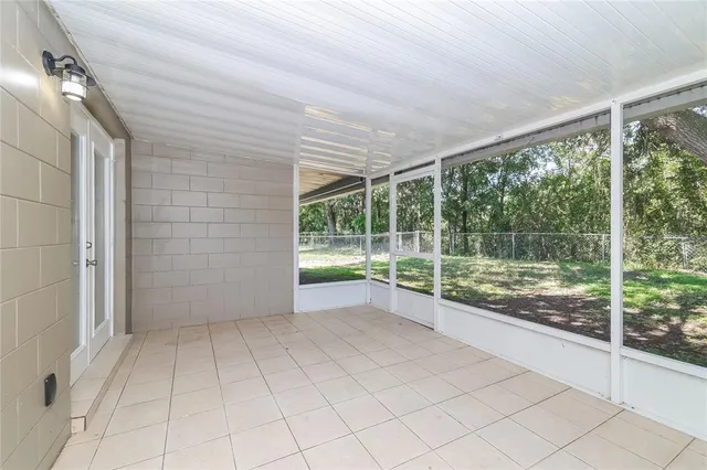 a view of a room with sliding glass door