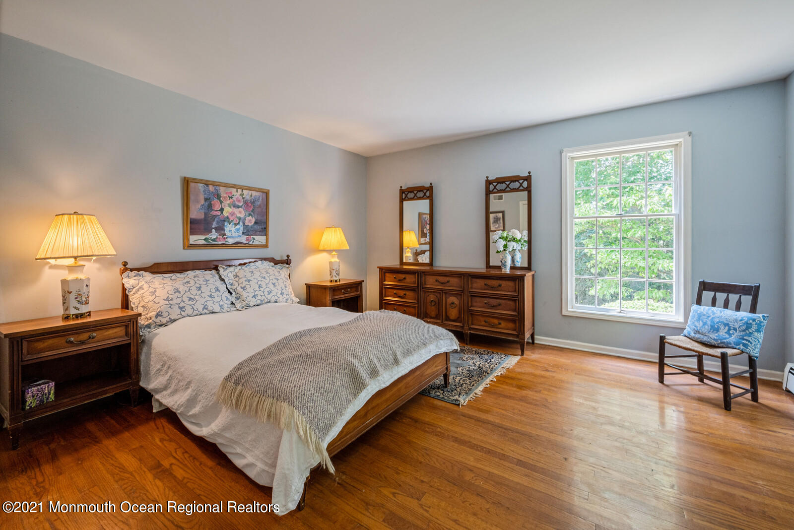 44 Wygant Road Cream Ridge, NJ 08514 - Photo 23 of 39 a spacious bedroom with a bed and a dresser next to a window