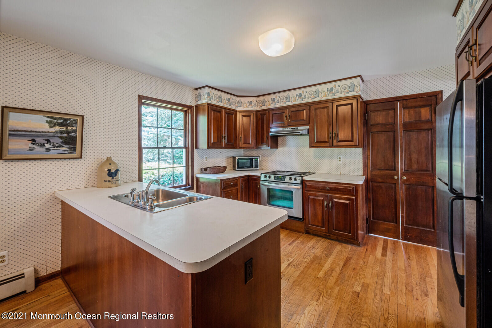44 Wygant Road Cream Ridge, NJ 08514 - Photo 10 of 39 a kitchen with stainless steel appliances granite countertop a sink stove and refrigerator