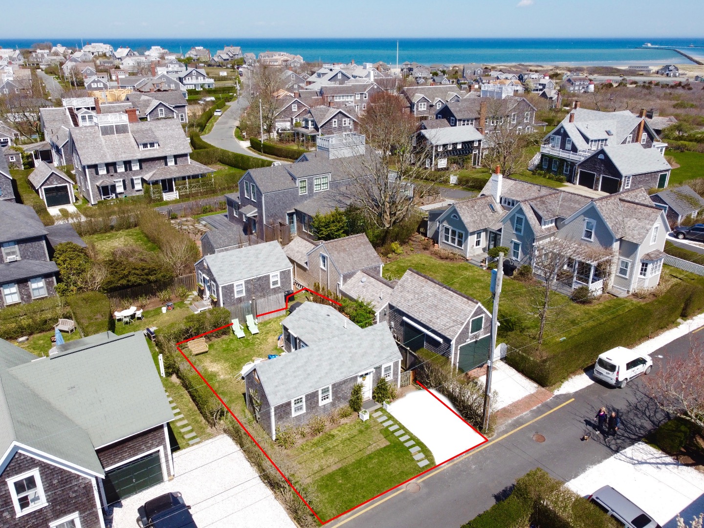4 Cabot Lane Nantucket, MA 02554 - Photo 1 of 16 an aerial view of a house with a ocean view