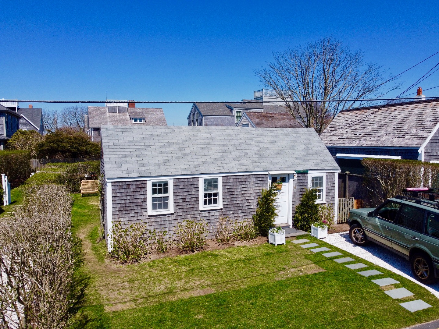 4 Cabot Lane Nantucket, MA 02554 - Photo 3 of 16 a view of a house with backyard and sitting area
