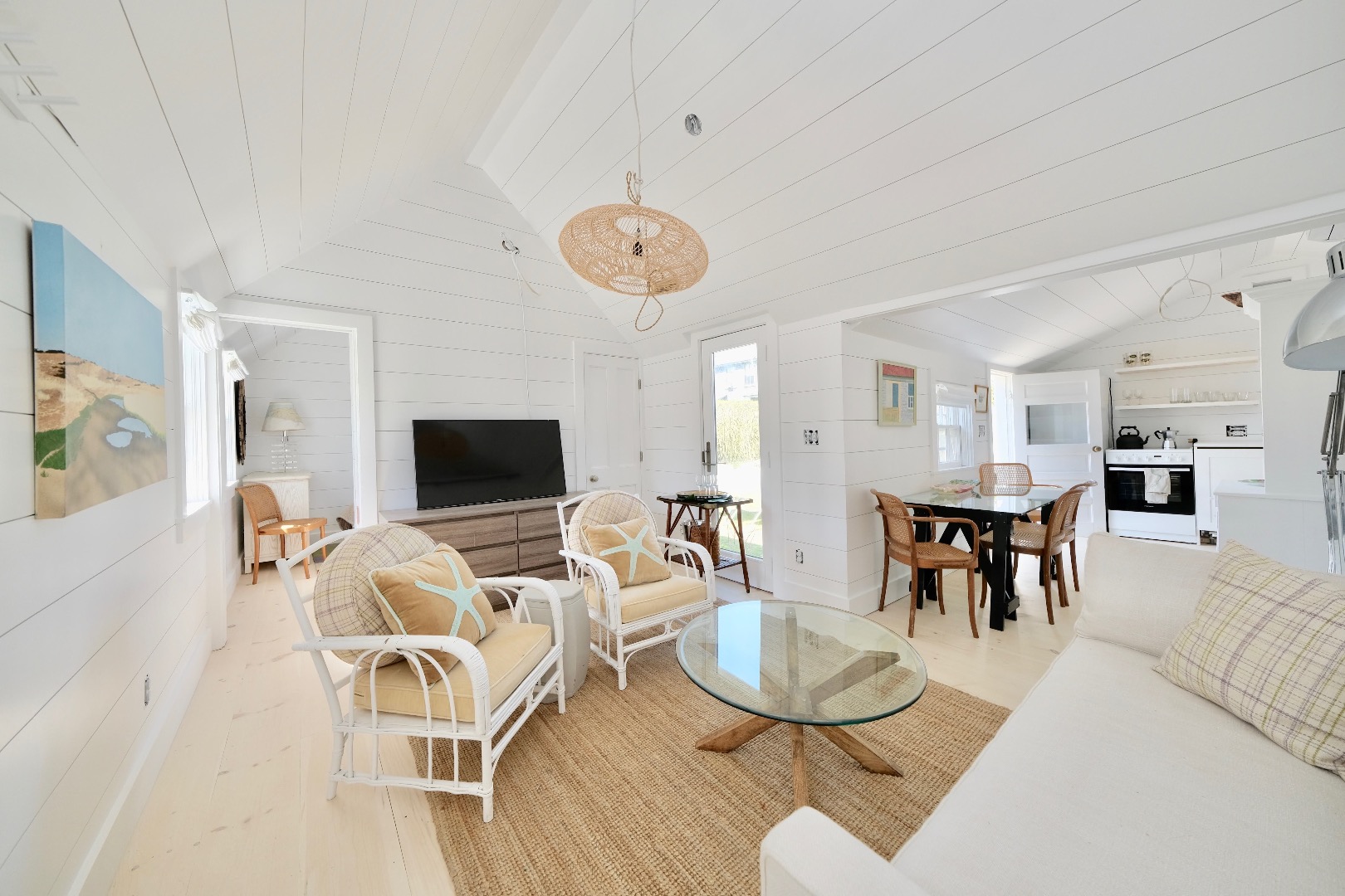 4 Cabot Lane Nantucket, MA 02554 - Photo 4 of 16 a living room with furniture kitchen view and a flat screen tv