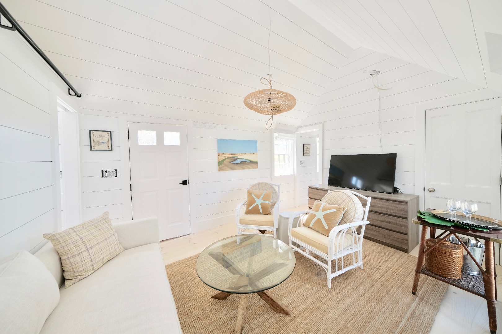 4 Cabot Lane Nantucket, MA 02554 - Photo 6 of 16 a living room with furniture and a flat screen tv