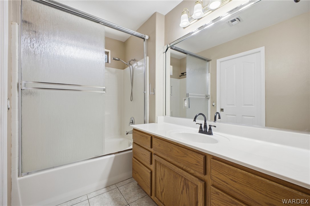 3918 North Eagle Rock Road Kingman, AZ 86409 - Photo 31 of 44 a bathroom with a sink and a mirror