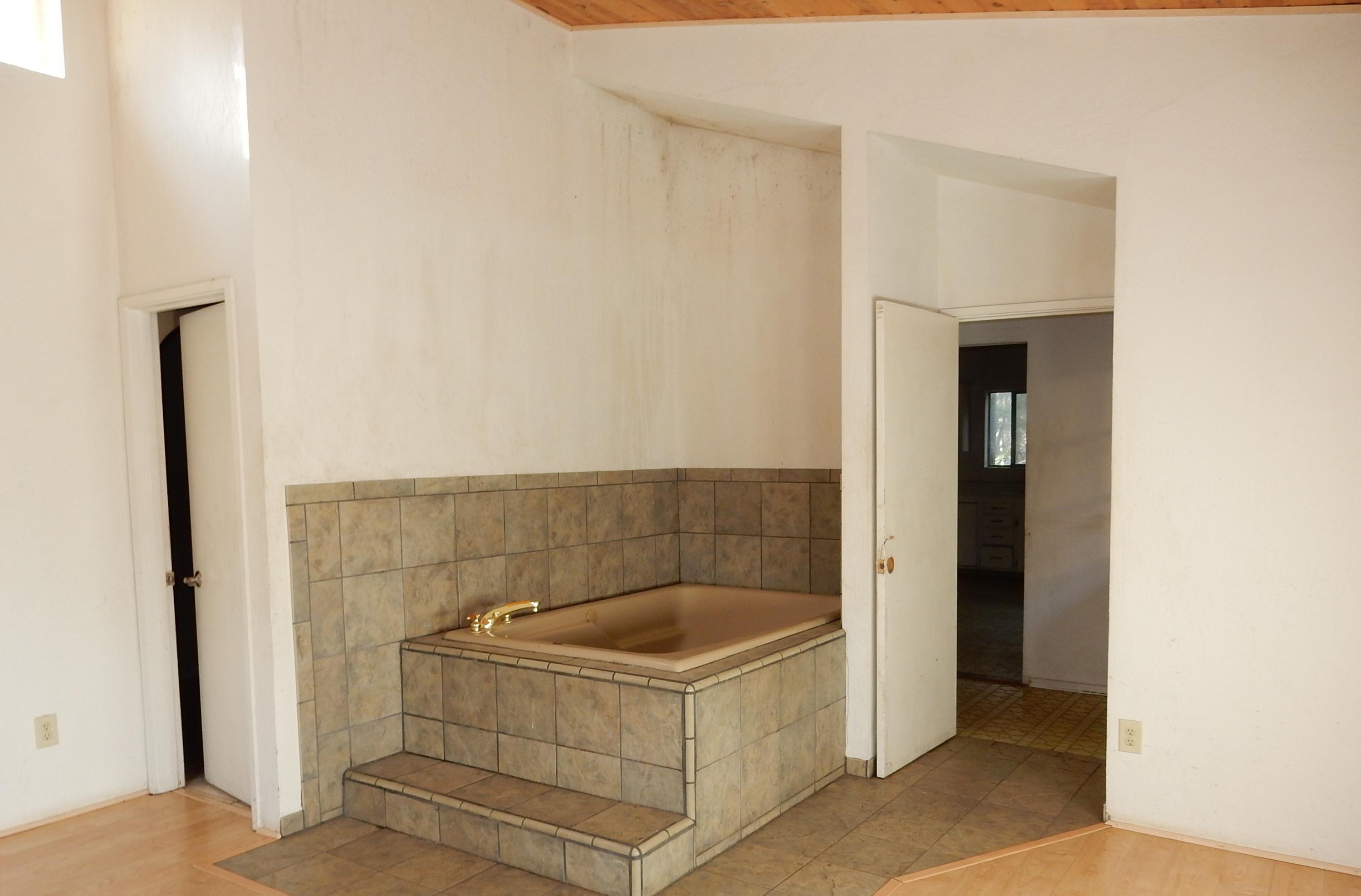 12 Billys Peak Road Trinity Center, CA 96091 - Photo 16 of 21 a bathroom with a tub and sink