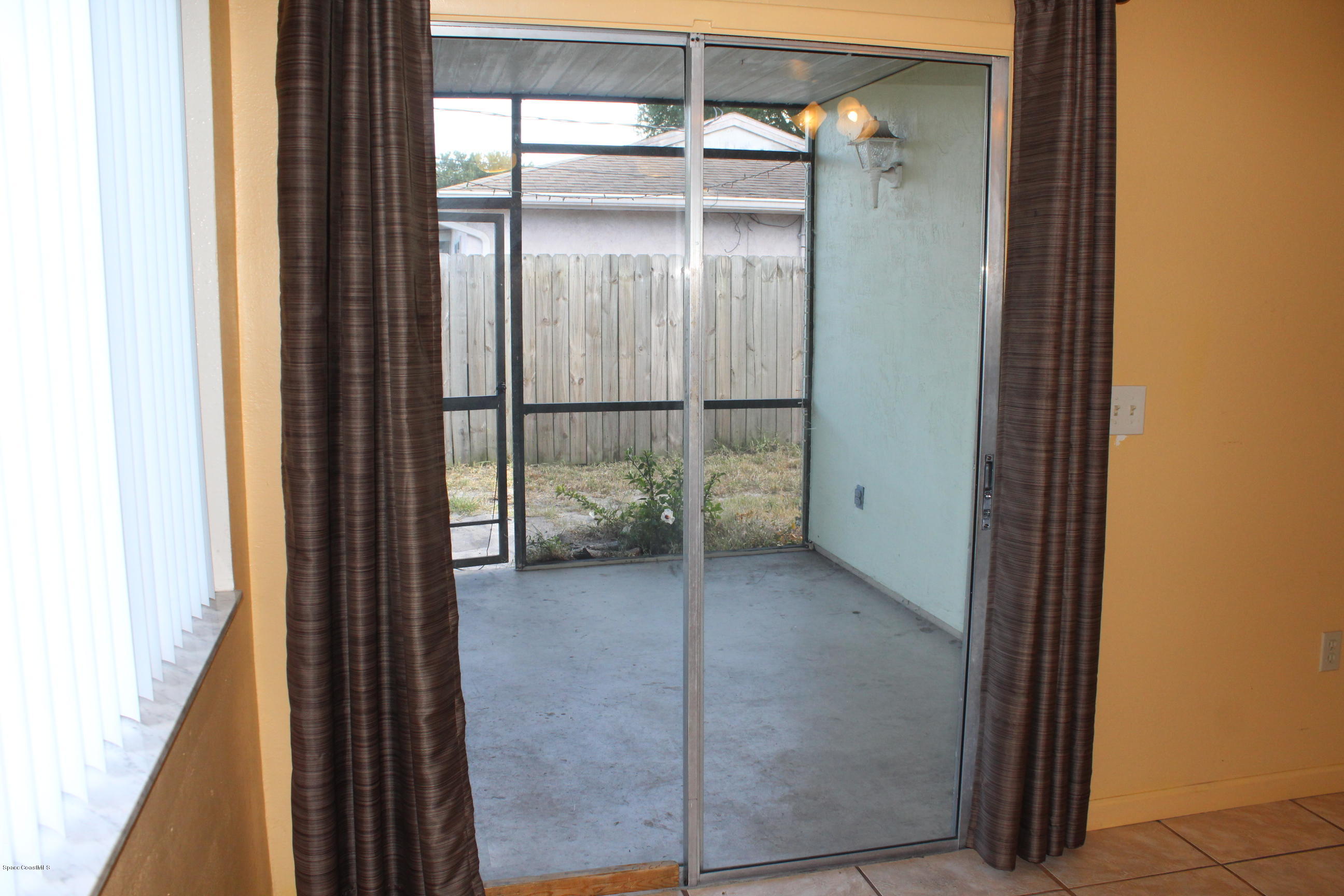 269 Capron Road Cocoa, FL 32927 - Photo 5 of 18 Screened Porch