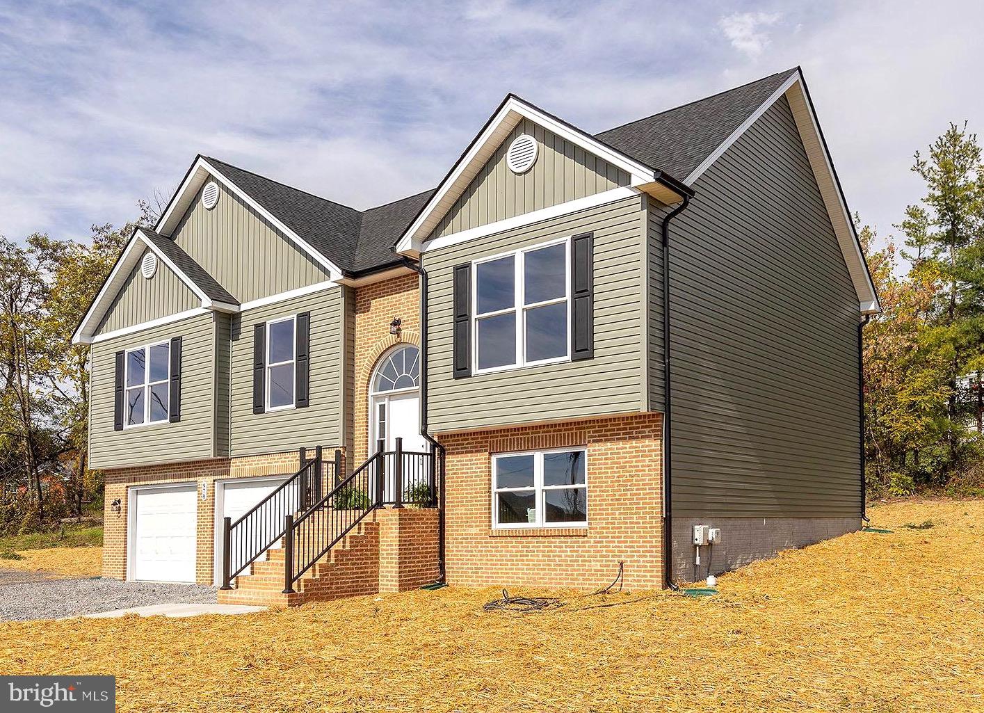 978 Round Hill Road Winchester, VA 22603 - Photo 1 of 41 BLACK GUTTERS and DOWNSPOUTS -BRICK and CUSTOMRAIL