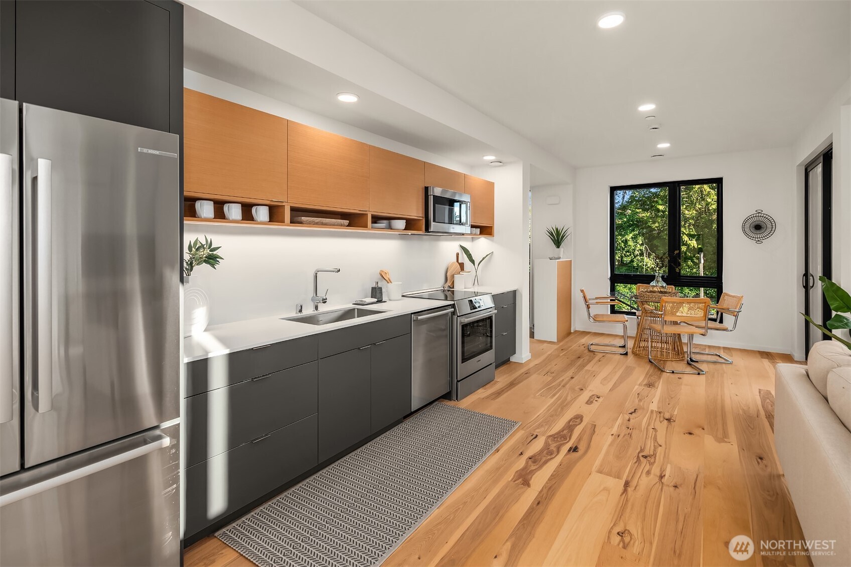 210 Shepard Way Northwest Bainbridge Island, WA 98110 - Photo 11 of 32 a kitchen with stainless steel appliances granite countertop a refrigerator and a sink