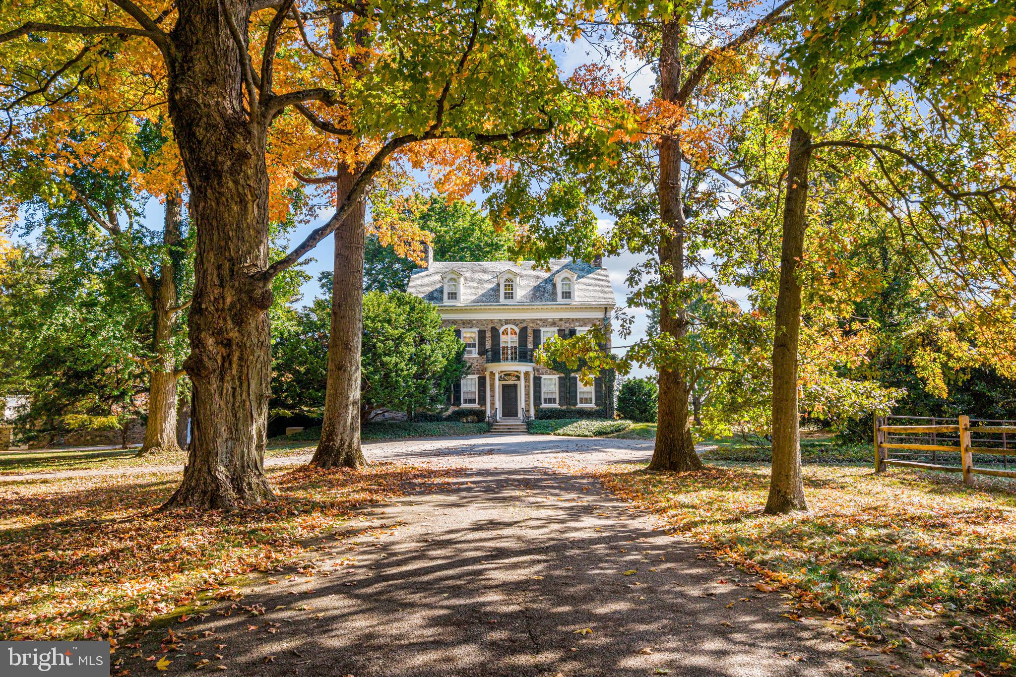 a house with trees in front of it