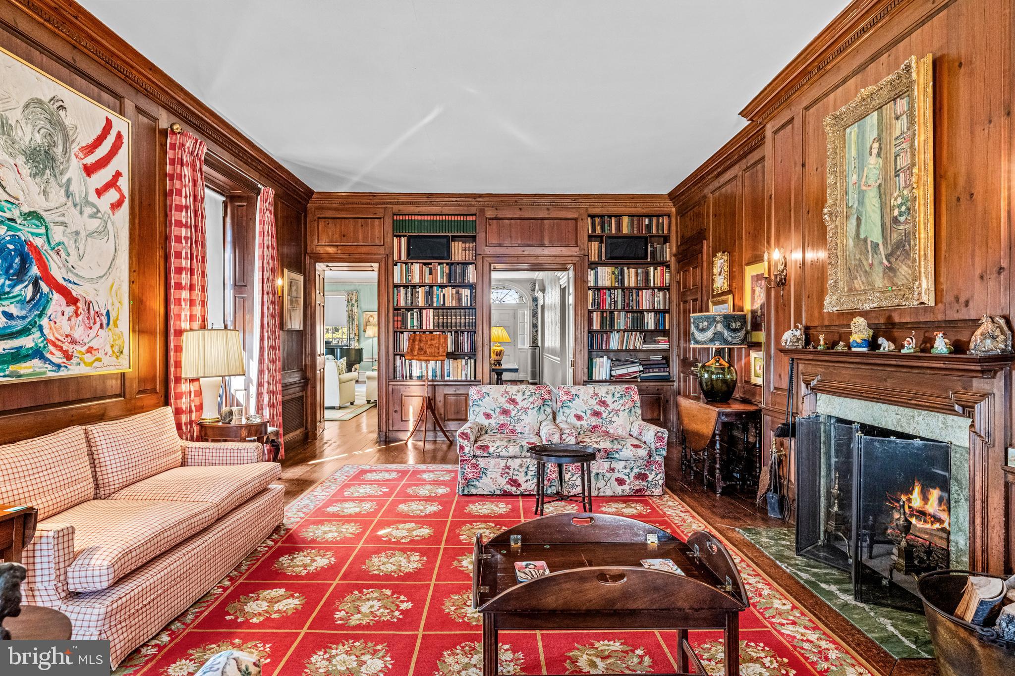 705 Church Road Villanova, PA 19085 - Photo 16 of 54 a room with furniture a rug and a fireplace