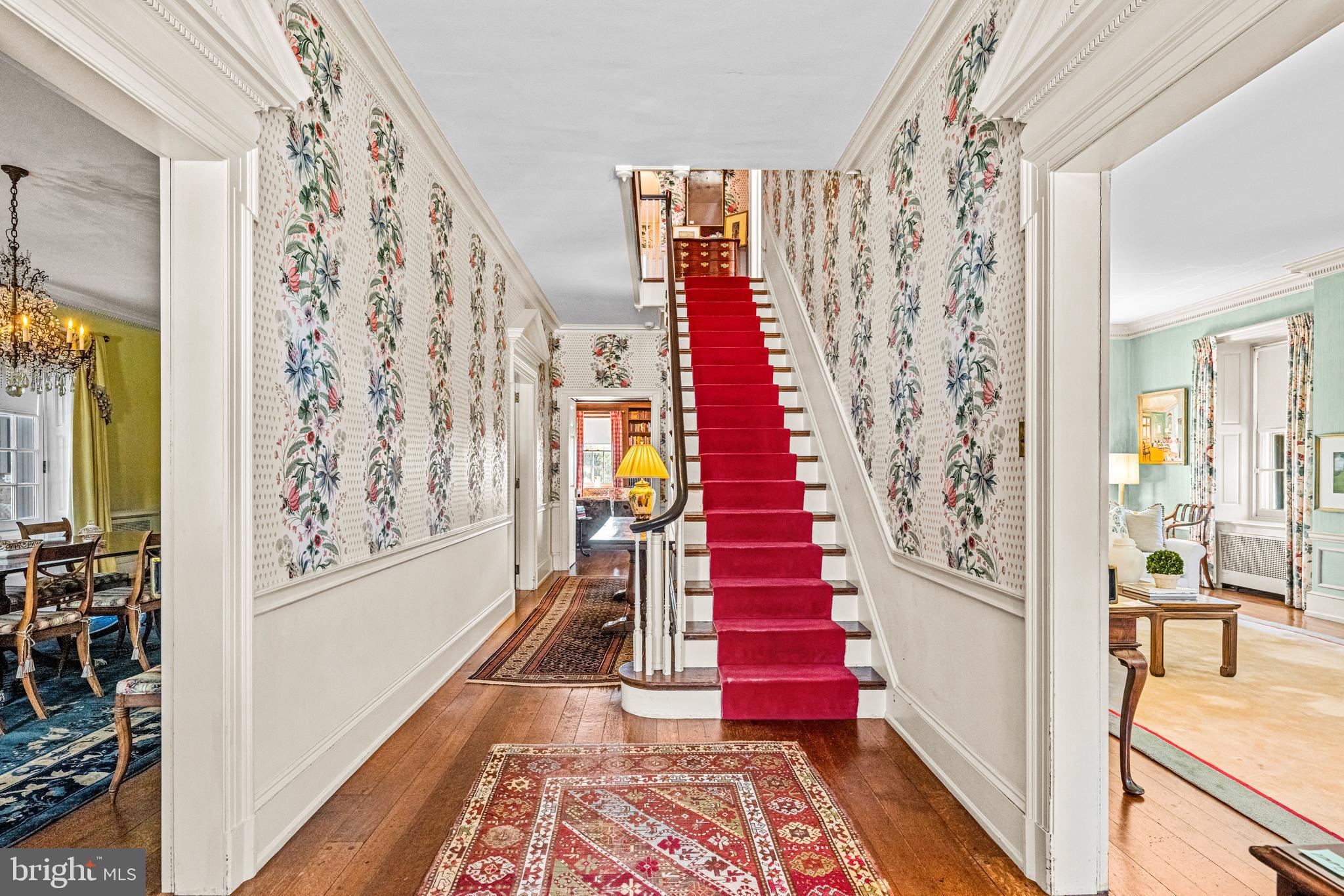 705 Church Road Villanova, PA 19085 - Photo 8 of 54 a view of a hallway with wooden floor and windows
