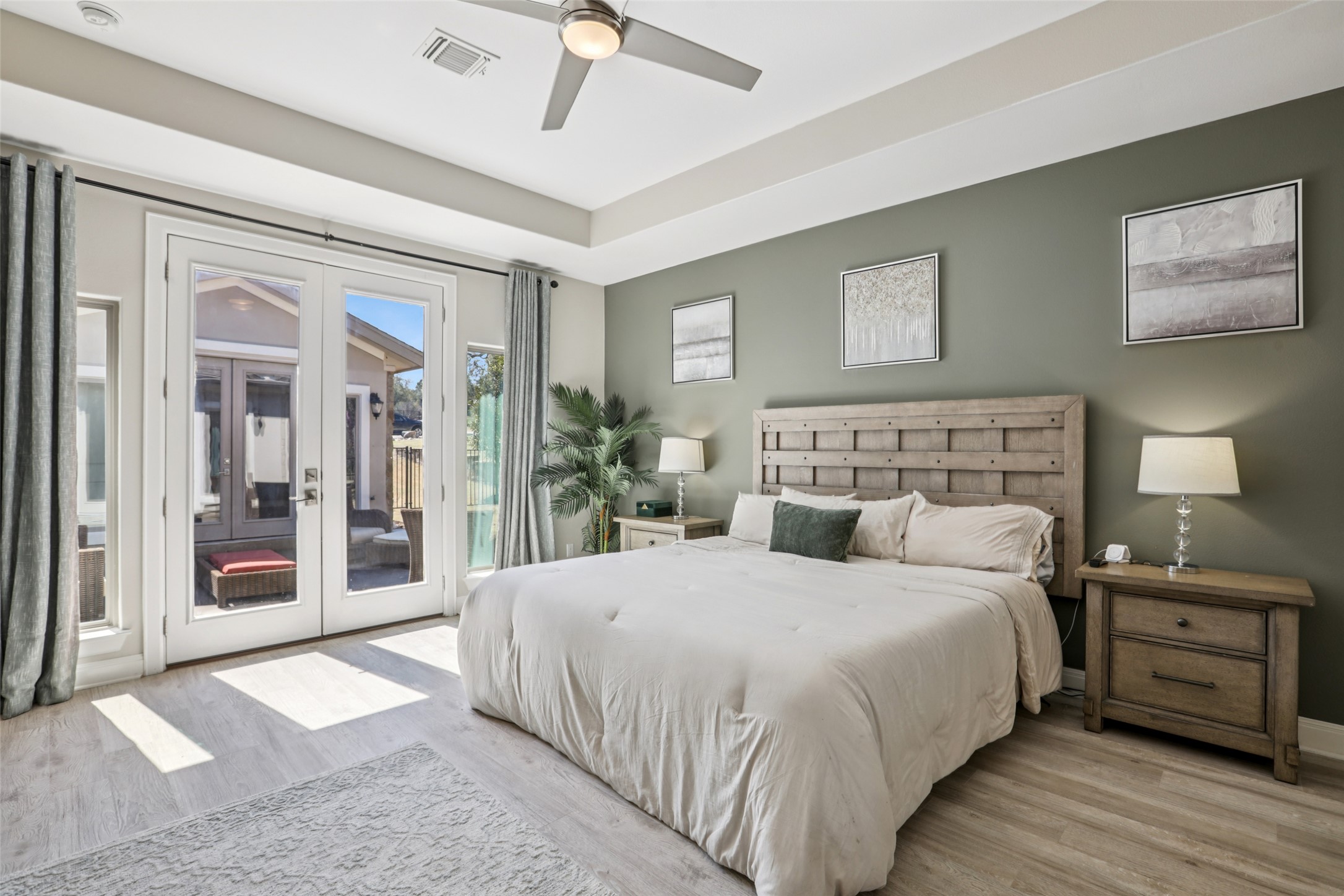 1000 Jonathan Cove Georgetown, TX 78628 - Photo 11 of 40 Relaxing primary suite w/ access to private patio