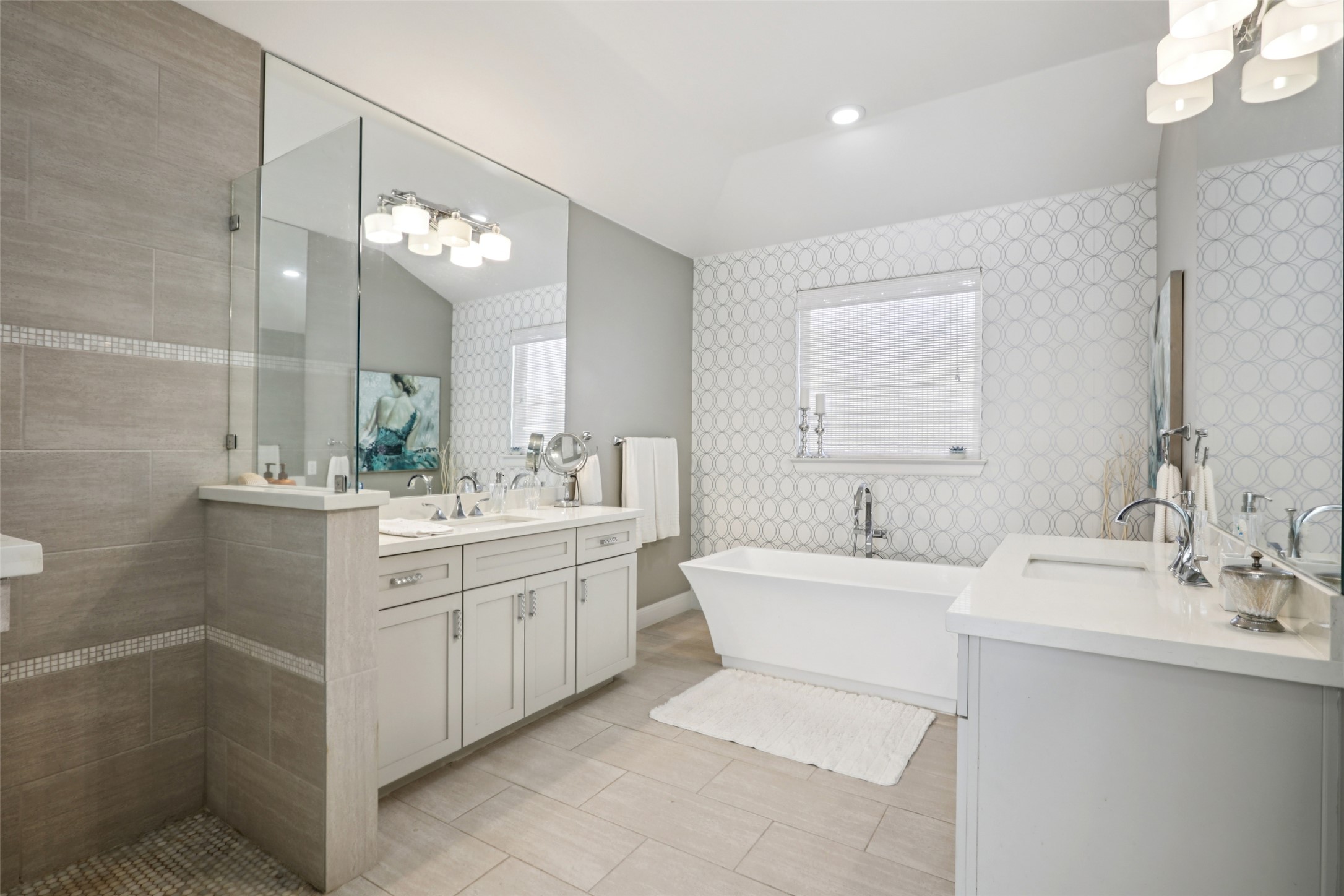 1000 Jonathan Cove Georgetown, TX 78628 - Photo 12 of 40 Luxurious primary bath w/ walk-in shower, dual vanities & stand alone soaking tub