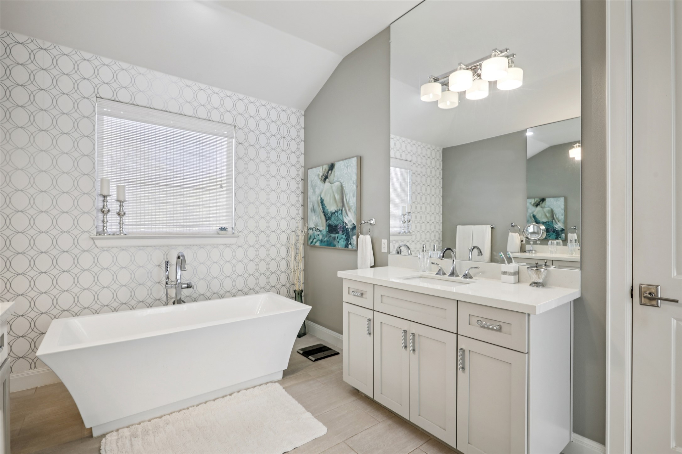 1000 Jonathan Cove Georgetown, TX 78628 - Photo 13 of 40 Luxurious primary bath w/ walk-in shower, dual vanities & stand alone soaking tub