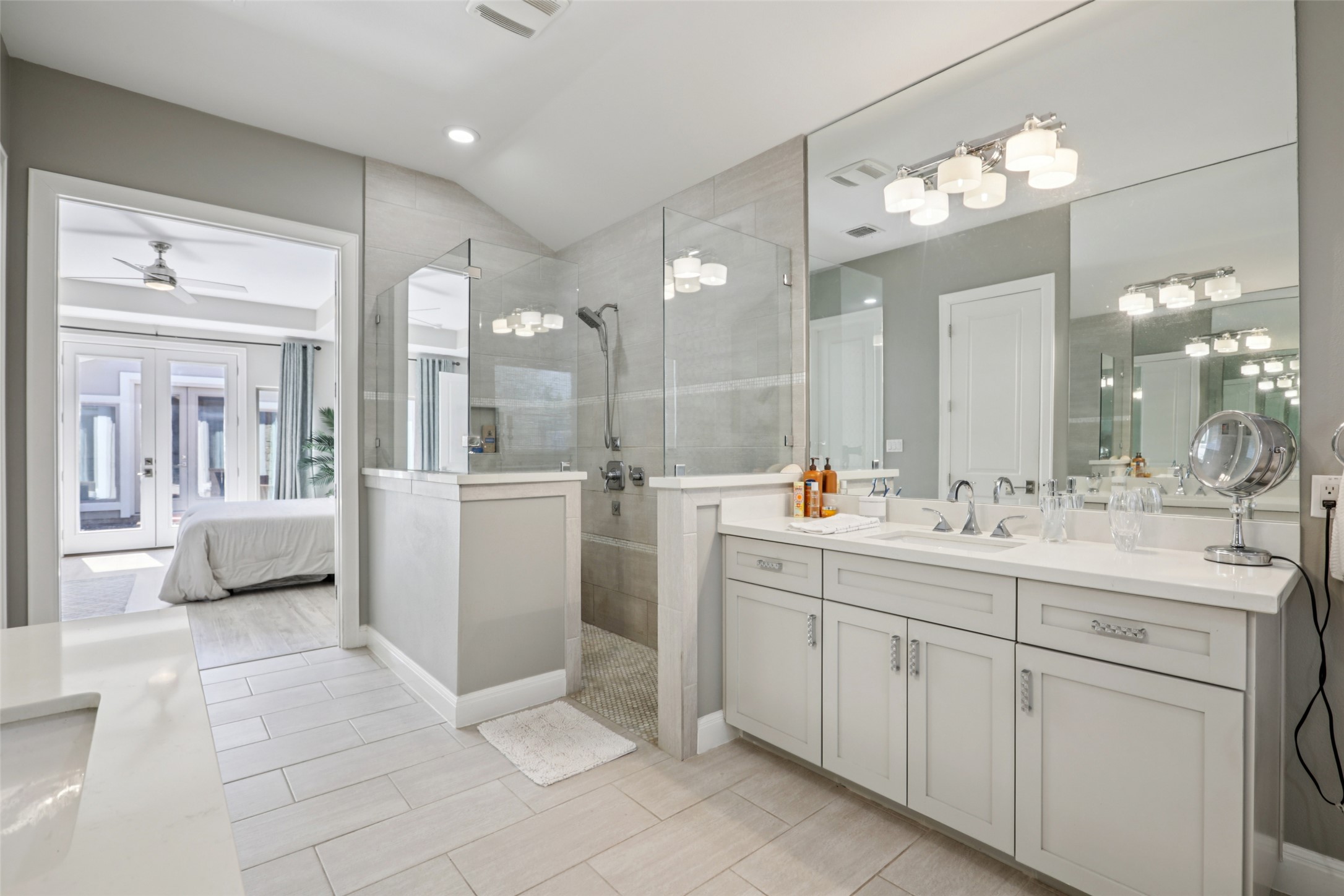 1000 Jonathan Cove Georgetown, TX 78628 - Photo 14 of 40 Luxurious primary bath w/ walk-in shower, dual vanities & stand alone soaking tub