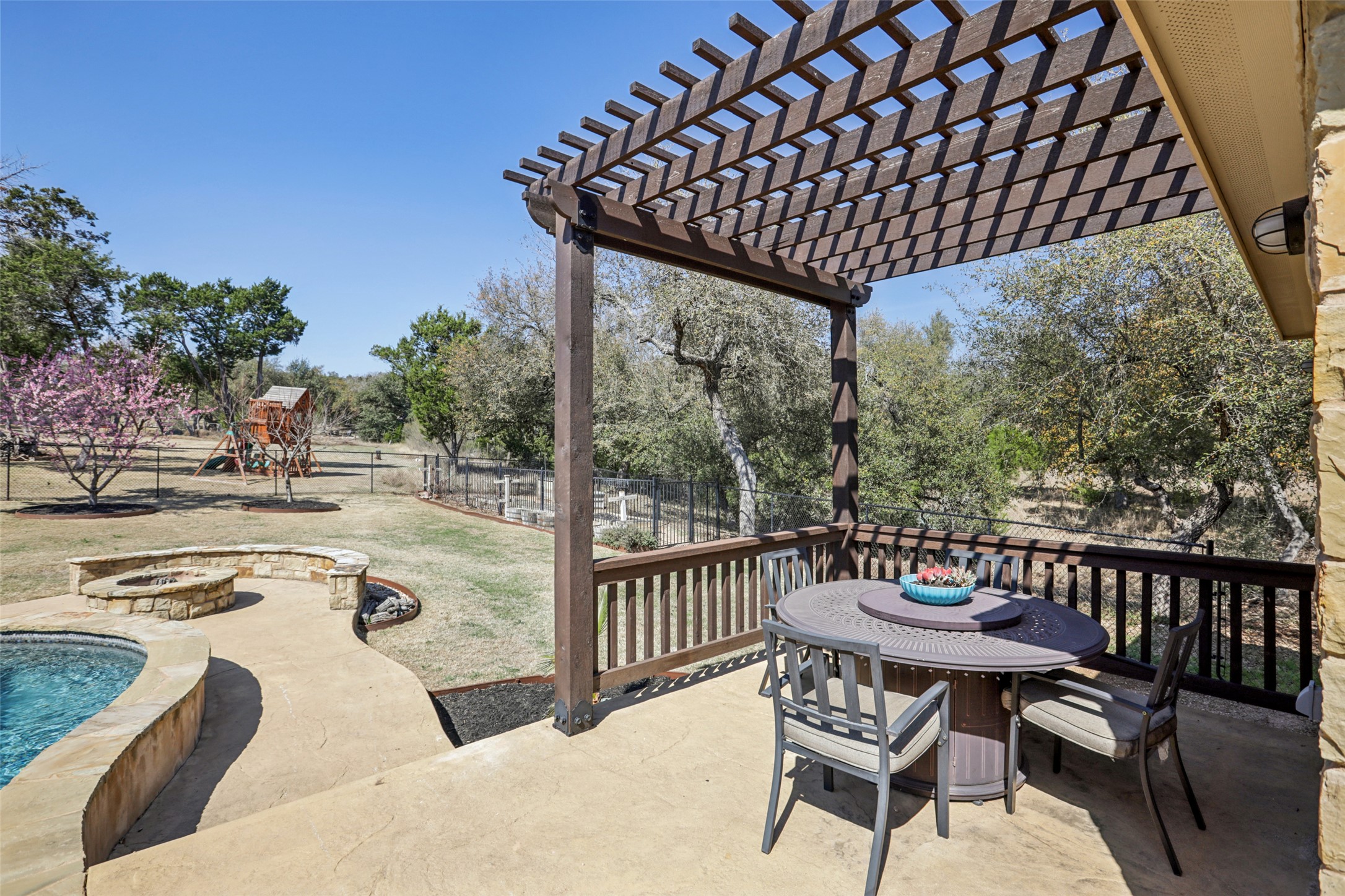 1000 Jonathan Cove Georgetown, TX 78628 - Photo 31 of 40 Patio seating area w/ arbor attached to pool house